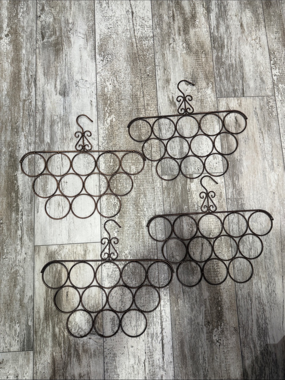 Decorative Brown Metal hanging Dcarf Rack - Set of 4